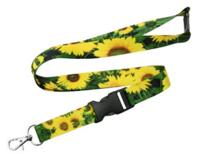 Farbenfroher Polyester-Lanyard mit Sonnenblumenmuster, Sicherheitsverschluss und abnehmbarer Schnalle, ideal für sommerliche Events und Markenpräsenz. Erhältlich bei AMGS Group.