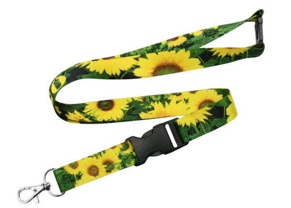 Farbenfroher Polyester-Lanyard mit Sonnenblumenmuster, Sicherheitsverschluss und abnehmbarer Schnalle, ideal für sommerliche Events und Markenpräsenz. Erhältlich bei AMGS Group.